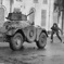 Youth confronting British army vehicle